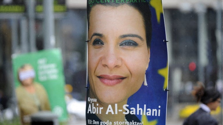 A campaign poster of Sweden’s Center Party depicts Abir Al-Sahlani on June 4, 2009, in downtown Stockholm.