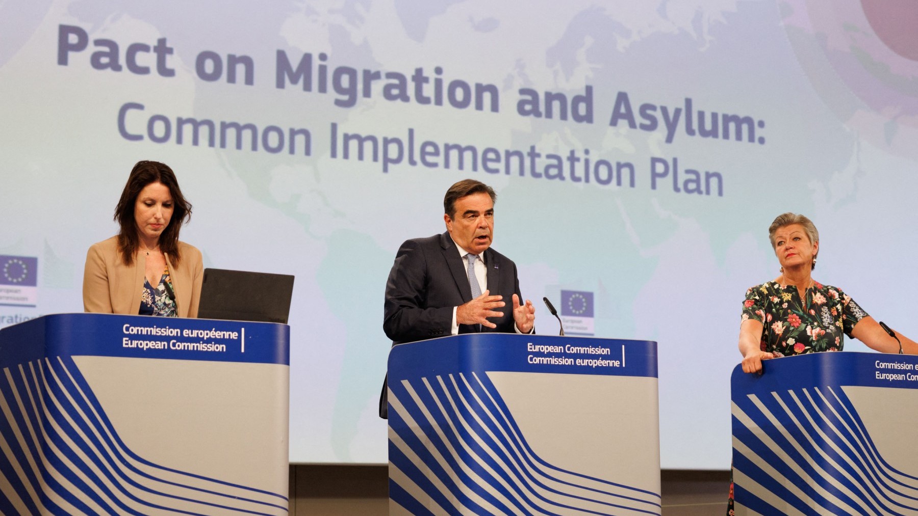 EU Commissioner for Home Affairs and Migration, Ylva Johansson (R) and European Commission vice-president "Protecting our European Way of Life" Margaritis Schinas (C) speak during a press conference on the Common Implementation Plan for the Pact on Migration and Asylum, at the EU commission in Brussels, on June 12, 2024.