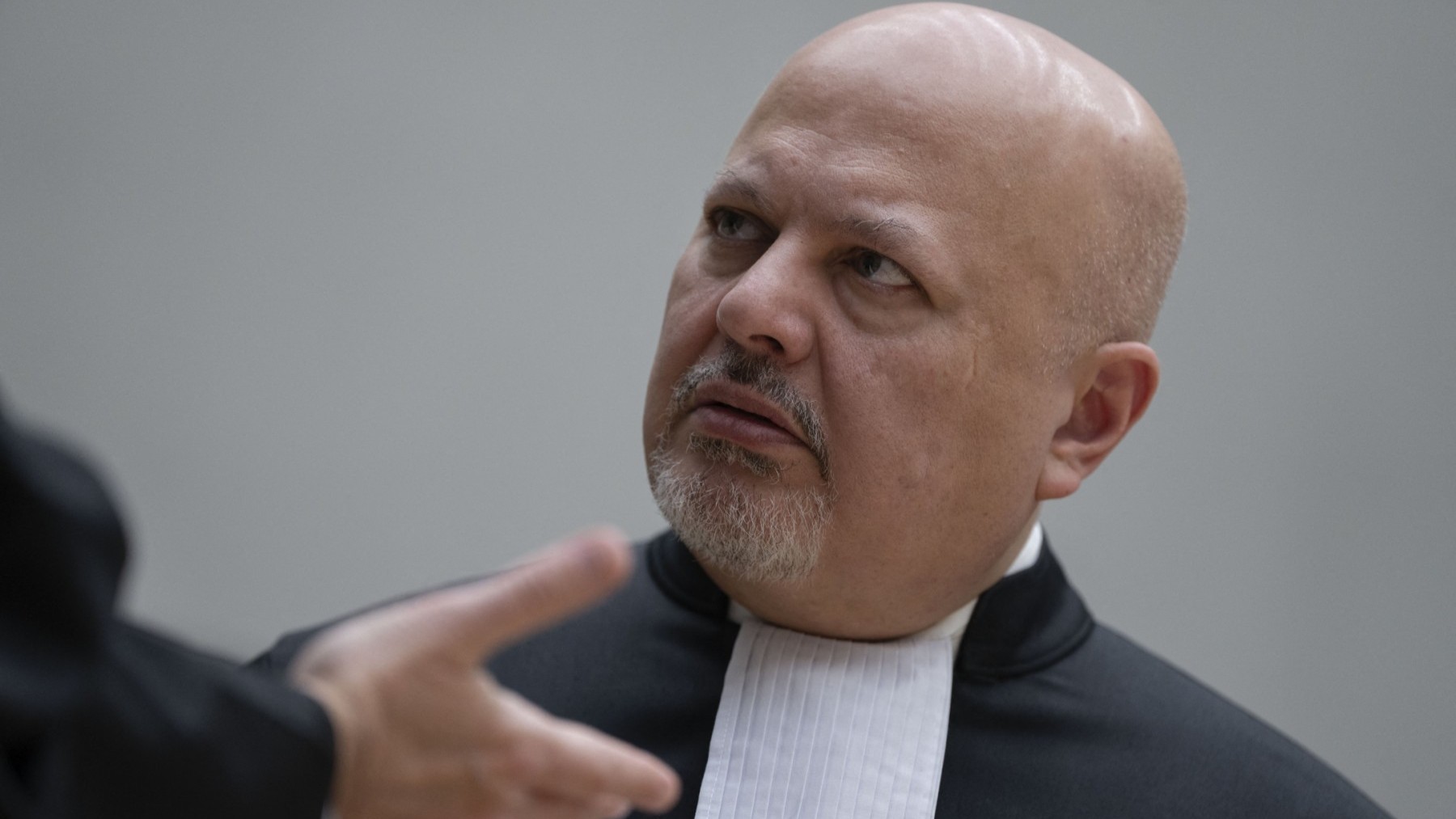 Chief Prosecutor Karim Khan talks prior to the first appearance of former Philippine President Rodrigo Duterte before the ICC on charge of crimes against humanity in The Hague on March 14, 2025.