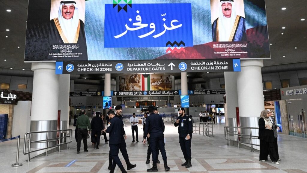 Kuwaiti security officers seen at Kuwait International Airport in Kuwait City on June 1, 2026, as the airport resumes operations following a phased reopening plan.