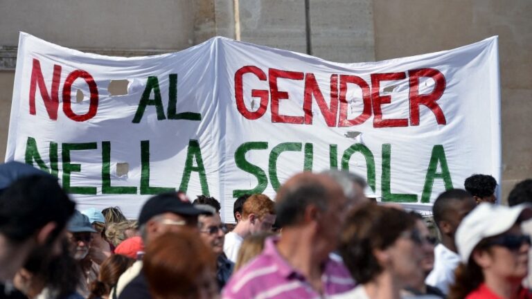 A banner reads “No gender in the school” during a rally in Rome on June 20, 2015, during a demonstration against the teaching of gender theories in schools.