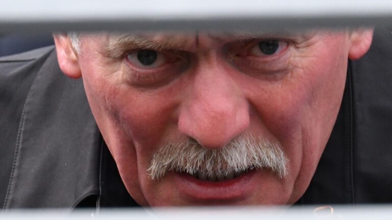 Kremlin spokesman Dmitry Peskov looks on during the Victory Day military parade on Red Square in Moscow on May 9, 2026.