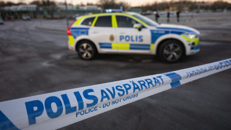 Police officers stand guard outside the adult education center Campus Risbergska school in Örebro, Sweden, on February 6, 2025 two days after a shooting there left eleven people dead.