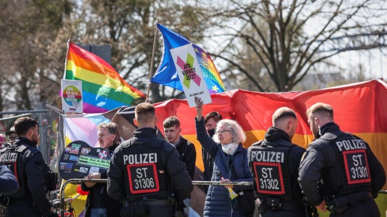 Protesters take part in a demonstration outside the Hyparschale hall in Magdeburg, eastern Germany, venue of a regional congress of the Alternative für Deutschland (AfD) party, on April 11, 2026.
