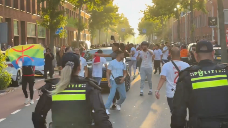 Police officers confront rioters in The Hague following the defeat of the Netherlands by Morocco at the football World Cup on June 30, 2026.