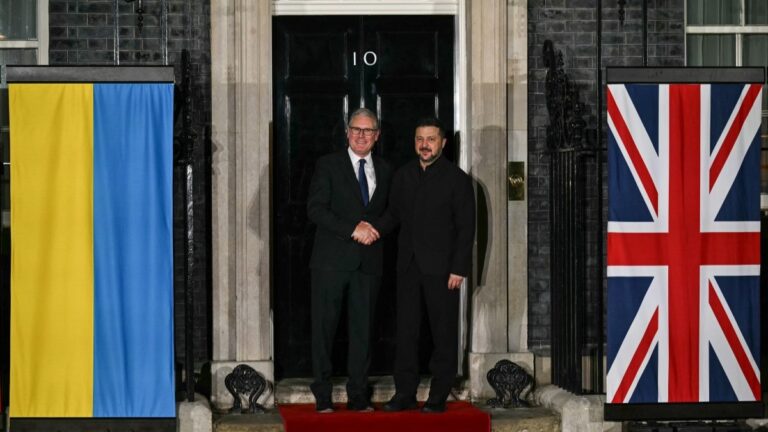 Ukraine’s President Volodymyr Zelensky (R) shakes hands with Britain’s Prime Minister Keir Starmer following their meeting at 10 Downing Street with the leaders of France and Germany in London on June 7, 2026.