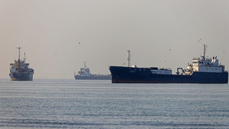 On June 1, 2026, vessels sail at Suru Beach in Bandar Abbas along the Strait of Hormuz.