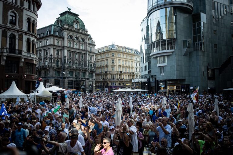 Attendees cheer at the FPÖ 70th anniversary event on the Stephansplatz in Vienna, Austria on June 20, 2026.