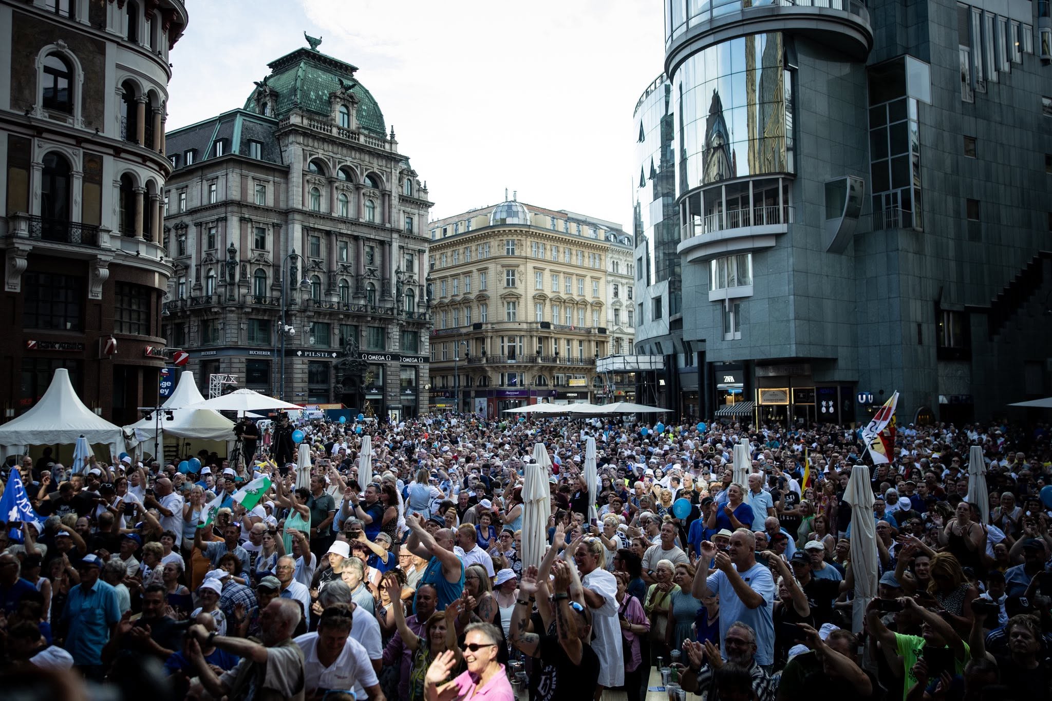 Attendees cheer at the FPÖ 70th anniversary event on the Stephansplatz in Vienna, Austria on June 20, 2026.