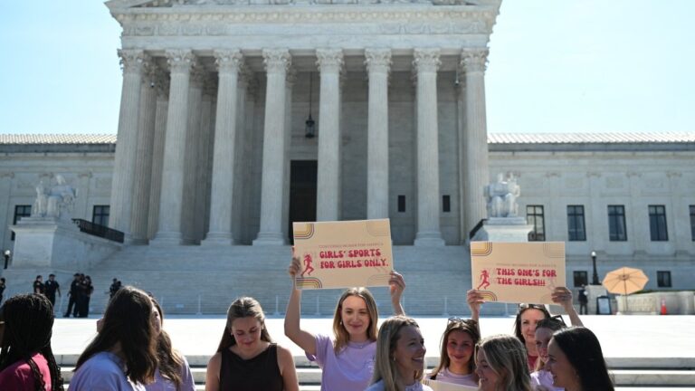 Young women demonstrate outside the U.S. Supreme Court as the court upheld state laws barring transgender athletes from competing in girls’ and women’s school sports in Washington, D.C., on June 30, 2026.