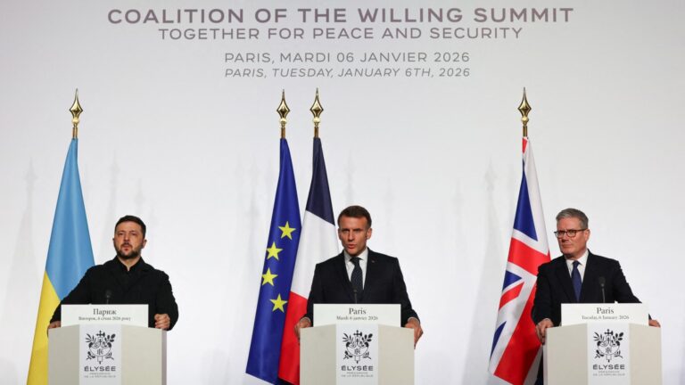 Ukraine’s President Volodymyr Zelensky, France’s President Emmanuel Macron and Britain’s Prime Minister Keir Starmer deliver a press conference during the Coalition of the Willing summit on security guarantees for Ukraine, at the Elysée Palace in Paris on January 6, 2026.