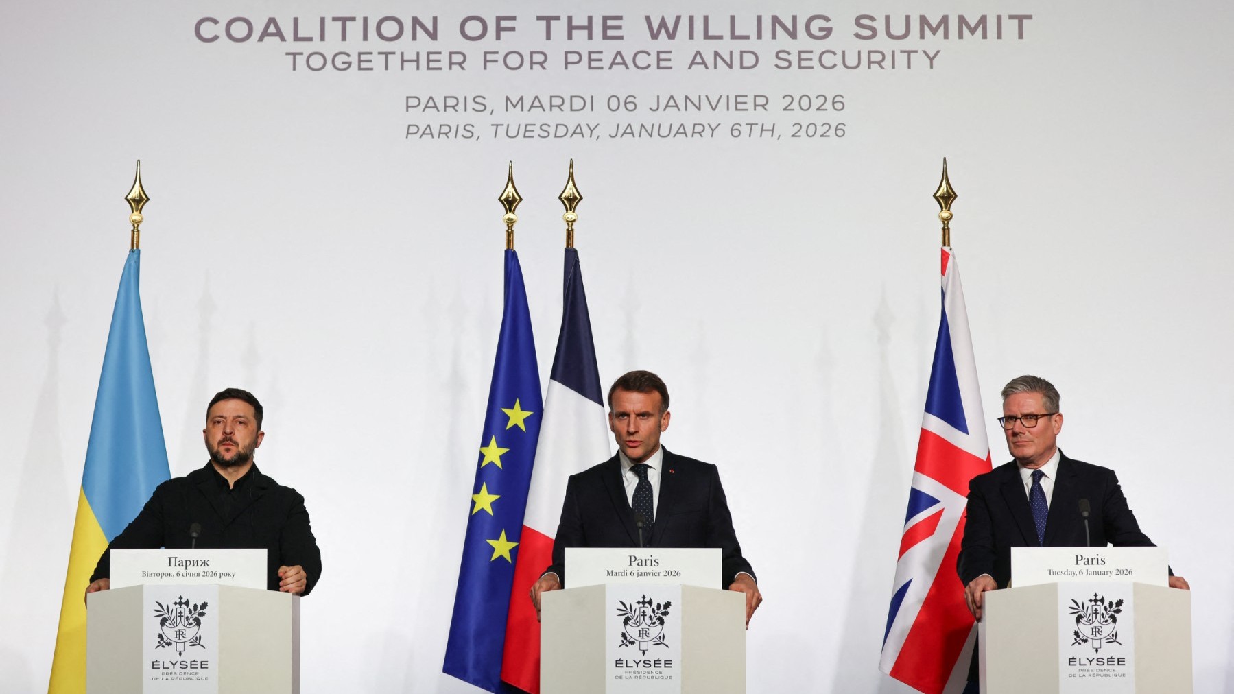 Ukraine’s President Volodymyr Zelensky, France’s President Emmanuel Macron and Britain’s Prime Minister Keir Starmer deliver a press conference during the Coalition of the Willing summit on security guarantees for Ukraine, at the Elysée Palace in Paris on January 6, 2026.