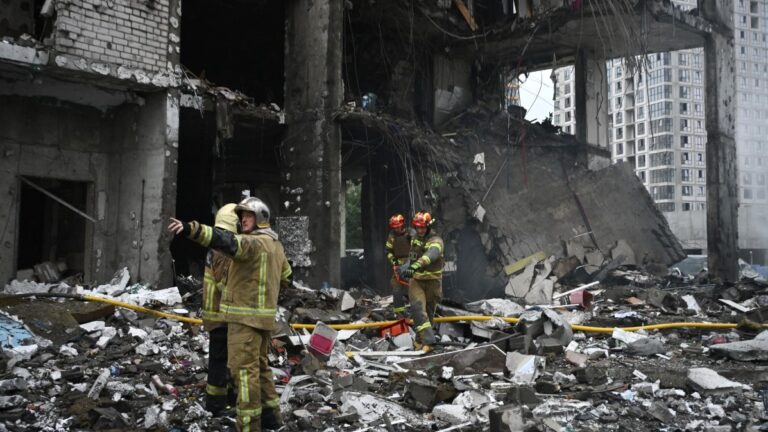 Rescuers work on a multistorey residential building, damaged following a Russian missile strike on the Ukrainian capital of Kyiv, on July 6, 2026.