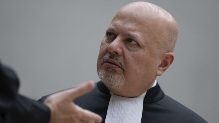 Chief Prosecutor Karim Khan talks prior to the first appearance of former Philippine President Rodrigo Duterte before the International Criminal Court (ICC) on charge of crimes against humanity over his deadly crackdown on narcotics, in The Hague on March 14, 2025.