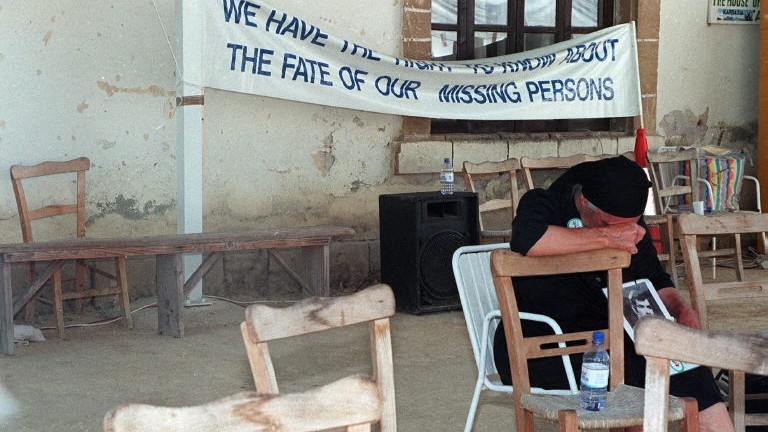 A lone Greek-Cypriot protestor cries during an anti-occupation protest in Nicosia, 20 July, on the 24th anniversary of the Turkish invasion of northern Cyprus.