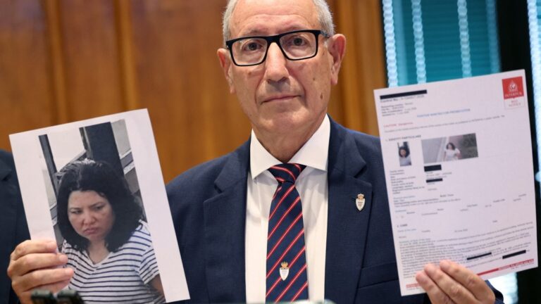 Monaco’s Public Safety director Eric Arella holds up the red notice issued by Interpol against a Ukrainian woman suspected of planting a bomb in Monaco that injured three people, including a Ukrainian-born tycoon, during a press conference in Monaco on July 3, 2026.