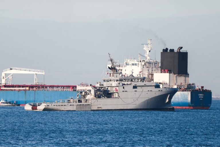 The oil tanker Grinch (R), suspected of belonging to Russia’s shadow fleet, is seen outside the coast of Martigues near the port of Marseille-Fos on January 25, 2026, as it’s surveilled by the French Navy.