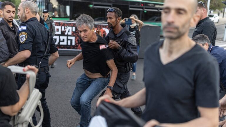Israeli police scuffle with protesters during a rally against the government and the war in Gaza outside the Knesset in Jerusalem on July 2, 2026, marking 1000 days since Hamas’s October 7, 2023 attack on Israel.