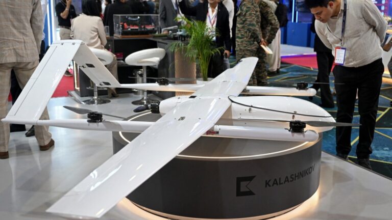 A visitor looks at a Russian Kalashnikov drone displayed at the International Police and Drone Expo 2026 in New Delhi on June 24, 2026.