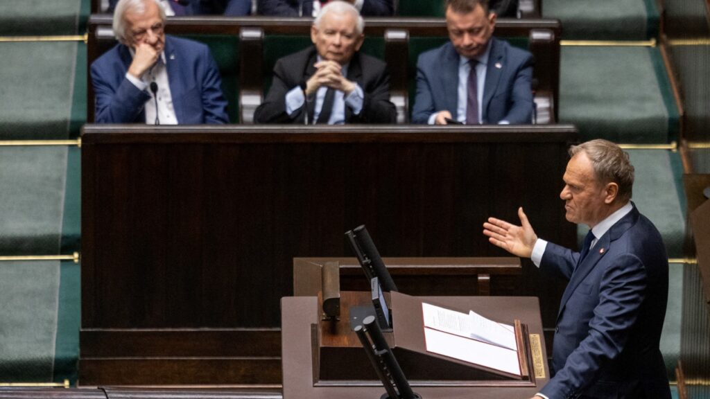 Poland’s Prime Minister Donald Tusk (R) addresses parliament on the situation in Ukraine, as Polish former prime minister and leader of the Law and Justice (PiS) party Jaroslaw Kaczynski (2ndL) listens, in Warsaw, on March 7, 2025.