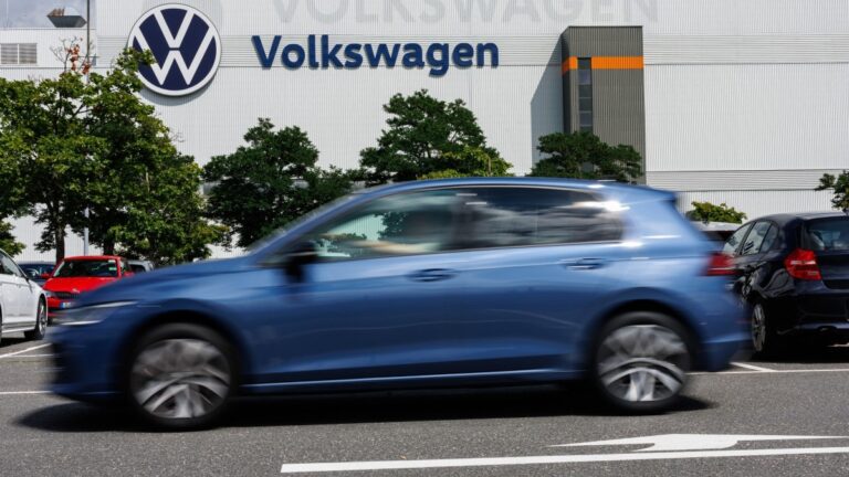 A car drives past the Zwickau Volkswagen Plant on July 9, 2026.