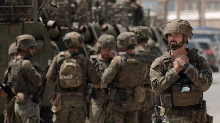 Spanish soldiers pictured at the border fence between Morocco and the Spanish North African enclave of Ceuta on August 15, 2026
