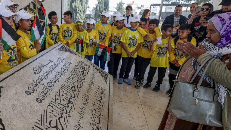 Schoolchildren visit the tomb of late Palestinian leader Yasser Arafat, at the Palestinian Authority headquarters in the West Bank city of Ramallah, on November 11, 2024.