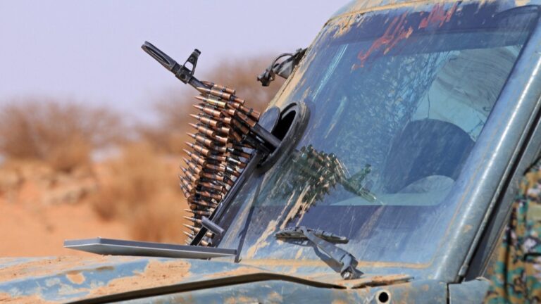 The armed defectors from the paramilitary Rapid Support Forces (RSF) arrive in a vehicle as they are believed to be surrendering to the Sudanese military, in the west of Omdurman on August 19, 2026.
