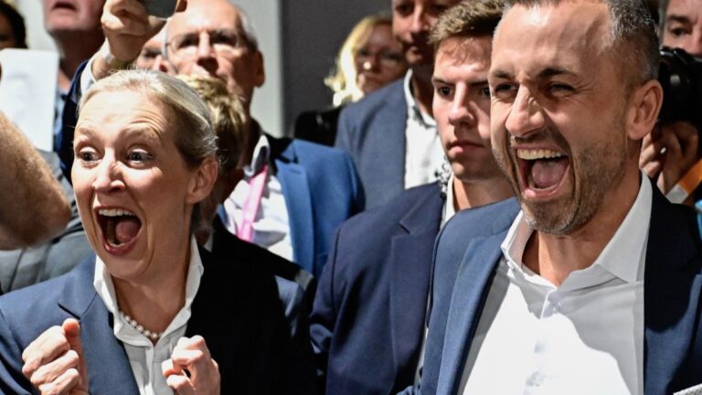 AfD top candidate Ulrich Siegmund and AfD co-leader Alice Weidel celebrate after exit polls following Saxony-Anhalt's state elections at the fairgrounds in Magdeburg, Eastern Germany on September 6, 2026.